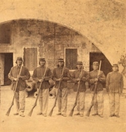 Detail from an undated stereoscopic view card entitled, "Indian guard confined in Fort Marion, St. Augustine, Fla."