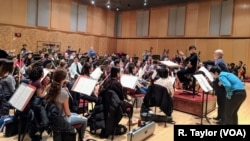 Conductor Chen Lin, composer Chen Qigang, and Juilliard students rehearse for the closing night concert of the 2018 Focus! Festival, “China Today.”