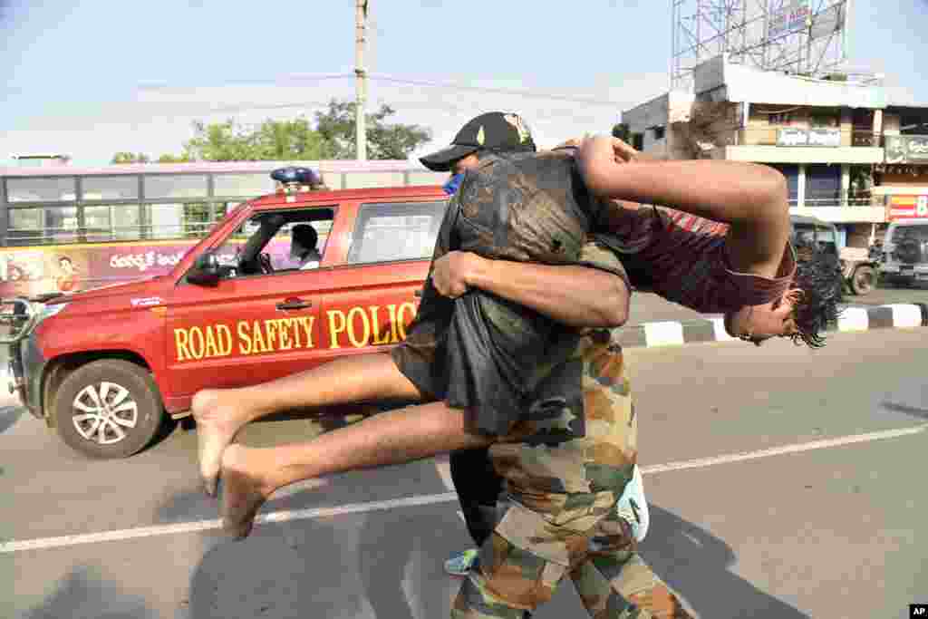 A boy affected by a chemical gas leak is carried for medical treatment in Vishakhapatnam, India.