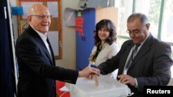 Lebanon's Prime Minister Tammam Salam casts his ballot at a polling station during Beirut's municipal elections, Lebanon, May 8, 2016. Despite a grassroots effort to take on country's stagnant political system, establishment candidates have taken the lead in the poll.