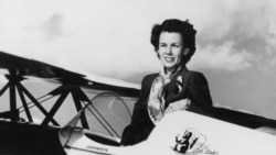 Betty Skelton poses with her airplane "Little Stinker."