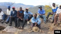Some MDC-T supporters currently living in a mountainous area in the Muzarabani communal lands, Mashonaland Central Province. They fled their homes after being intimidated by Zanu PF supporters.