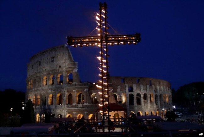 A view of the ancient Colosseum in Rome, April 14, 2017. Pope Francis presided over the Via Crucis (Way of the Cross) torchlight procession on Good Friday in front of Rome's Colosseum.