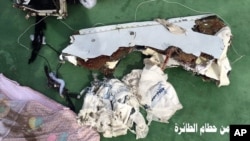 Part of the wreckage from EgyptAir flight 804. Photo was posted Saturday, May 21, 2016, on the official Facebook page of the Egyptian Armed Forces spokesman. Arabic reads: “ Part of plane wreckage.”