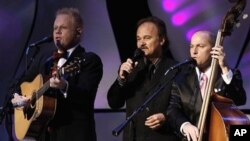 Jimmy Fortune, center, former member of the Statler Brothers, performs with Jamie Dailey, left, and Darrin Vincent, right, during the International Bluegrass Music Awards show in Nashville, Tennessee, 30 Sept. 2010