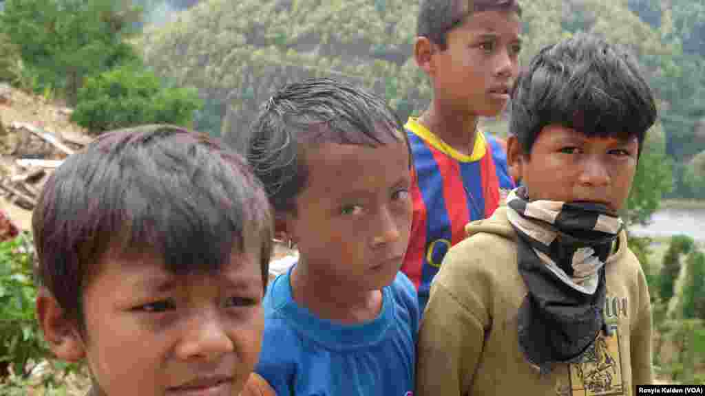 Some of the child survivors of the earthquake in Majigaon, a small fishing village on the banks of the Indravati River.