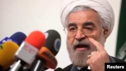 Iranian presidential candidate Hassan Rowhani, Iran's former top nuclear negotiator, speaks during a campaign rally in Tehran, May 30, 2013.