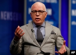 FILE - Author Michael Wolff is pictured at the Newseum in Washington, April 12, 2017, as he moderates a conversation with presidential counselor Kellyanne Conway during a forum titled "The President and the Press: The First Amendment in the First 100 Days."