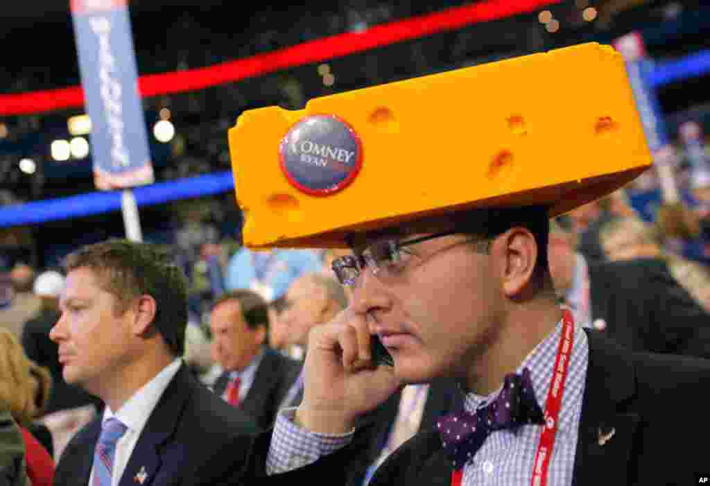 Delegate Sol Grosskopf from Shawano, Wisconisin wears cheesehead hat on the convention floor.