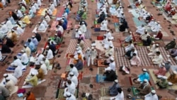 Muslims attend Eid al-Adha prayers at the Jama Masjid (Grand Mosque) during the outbreak of the coronavirus disease (COVID-19), in the old quarters of Delhi, India, August 1, 2020. (REUTERS/Adnan Abidi)