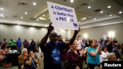 Leonard Smalls of the International Longshoremen's Association shows his support during a rally held by the International Association of Machinists and Aerospace Workers for Boeing South Carolina workers before Wednesday's vote to organize, in North Charleston, South Carolina, Feb. 14, 2017.