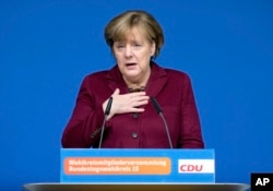 German Chancellor Angela Merkel delivers a speech at a local meeting of her Christian Democrats in Grimmen, northern Germany, Jan. 28, 2017.