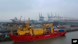 In this image taken from drone video, the Ocean Zephyr is docked in Bremerhaven, Germany, Wednesday Jan. 23, 2019.