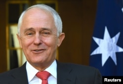 FILE - Australian Prime Minister Malcolm Turnbull reacts as he speaks during a media conference regarding the outcome of the Marriage Equality survey in Canberra, Australia, Nov. 15, 2017.