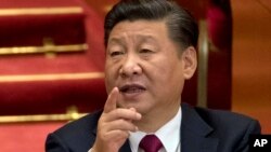 中共最高领导人习近平在北京人大会堂召开的十九大闭幕式上。（2017年10月24日）