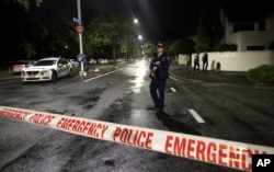 A police officer patrols at a cordon near a mosque in central Christchurch, New Zealand, March 15, 2019. Multiple people were killed in mass shootings at two mosques full of worshipers attending Friday prayers.