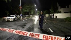 A police officer patrols at a cordon near a mosque in central Christchurch, New Zealand, March 15, 2019. Multiple people were killed in mass shootings at two mosques full of worshipers attending Friday prayers.