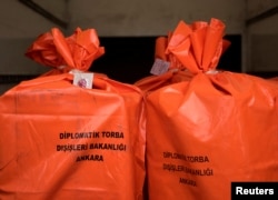 Votes from expatriates on the constitutional referendum are bagged up for shipment to Turkey at Tegel airport in Berlin, Germany, April 11, 2017.