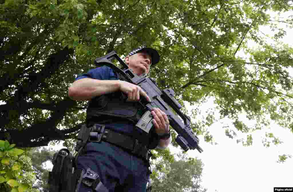 An armed police officer stands in the grounds of the Celtic Manor resort, near Newport, in Wales Sept. 4, 2014.