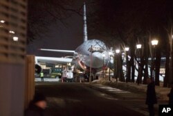 A plane that carried Russian diplomats and their families home, having been ordered to leave Britain as part of a standoff over a nerve agent attack on British soil, sits at the Vnukovo 2 government airport outside Moscow, March 20, 2018.