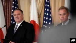 Secretary of State Mike Pompeo and Acting Secretary of Defense Patrick Shanahan listen to a question during their news conference with Japanese Foreign Minister Taro Kono and Defense Minister Takeshi Iwaya on April 19, 2019, at the Department of State in 