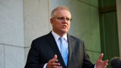 FILE - Australian Prime Minister Scott Morrison speaks during a press conference at Parliament House in Canberra, Aug. 17, 2021.