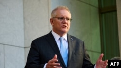 Perdana Menteri Australia Scott Morrison berbicara selama konferensi pers di Gedung Parlemen di Canberra, 17 Agustus 2021. (Foto: AFP)