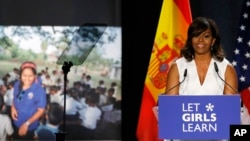 U.S. first lady Michelle Obama gives a speech as part of her "Let Girls Learn" initiative to a group of girls and young women in Madrid, Spain, June 30, 2016.