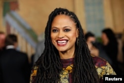 FILE - Director and executive producer Ava DuVernay poses at a screening of the film "Selma" during AFI Fest 2014 in Hollywood, California, Nov. 11, 2014.