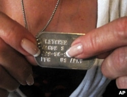 Dorine Kenney always wears her late son's "dog tag" military ID