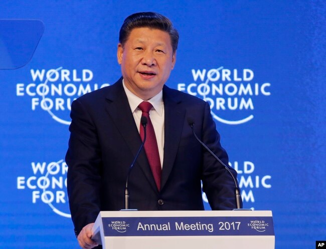 FILE - China's President Xi Jinping speaks at the World Economic Forum in Davos, Switzerland, Jan. 17, 2017.