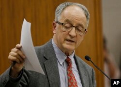 FILE - Bob Marshall, R-Prince William, gestures during a committee hearing at the Capitol in Richmond, Va., Jan. 19, 2017.