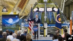NASA Administrator Jim Bridenstine talks to employees about the agency's progress toward sending astronauts to the moon and on to Mars during a televised event, Monday, March 11, 2019.