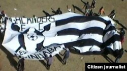 Highlanders fans celebrating after their team won at Barbourfields Stadium, Bulawayo.