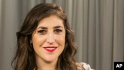 FILE - In this May. 23, 2017, file photo, actress and author Mayim Bialik poses for a photo in Los Angeles. In a Facebook Live interview with The New York Times on Oct. 16, 2017, Bialik discussed a recent opinion piece that drew accusations that she was blaming accusers of Harvey Weinstein.