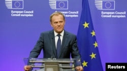 FILE - European Council President Donald Tusk briefs the media in Brussels, Belgium, June 24, 2016. On Tuesday, Tusk announced the bloc will hold a summit in late April to discuss the terms of Britain's departure from the EU.