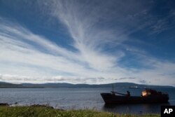 FILE - The Fyodor Silin boat is seen aground in Iturup Island, Russian Far East, Aug. 22, 2011.