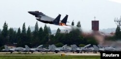 A fighter jet takes off from an air base in Gwangju, South Korea, May 16, 2018.