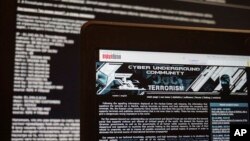FILE - Two Russian anti-terrorism websites on a computer screen are photographed, in Paris, France, July 24, 2017. Pyotr Levashov, a 37-year-old known as one of the world's most notorious spammers, was arrested earlier this year while vacationing with his family in Barcelona, Spain.