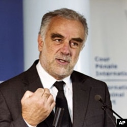 International Criminal Court (ICC) Prosecutor Luis Moreno Ocampo speaks at a news conference on Kenya at the ICC in The Hague, January 24, 2012