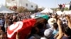 突尼斯反對派政壇人士喪禮發生抗議