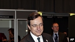 European Central Bank President Mario Draghi, takes his seat during the informal EU-meeting for EU Finance Ministers, in Copenhagen, Denmark, March 30 2012.