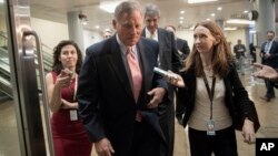 Sen. Richard Burr, R-N.C., chairman of the Senate Select Committee on Intelligence, arrives as House and Senate lawmakers from both parties gather for a classified briefing in a secure room about the federal investigation into President Donald Trump's 2016 campaign.