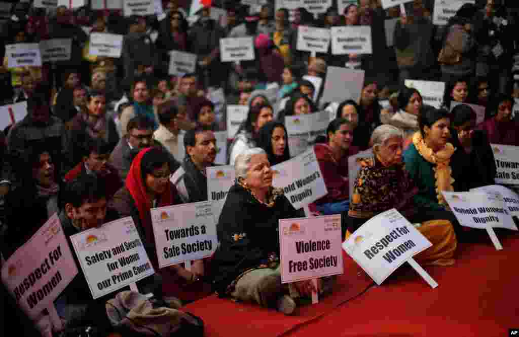 Indians sing devotional songs during a gathering to mourn the death of a rape victim in New Delhi, India, January 5, 2013.