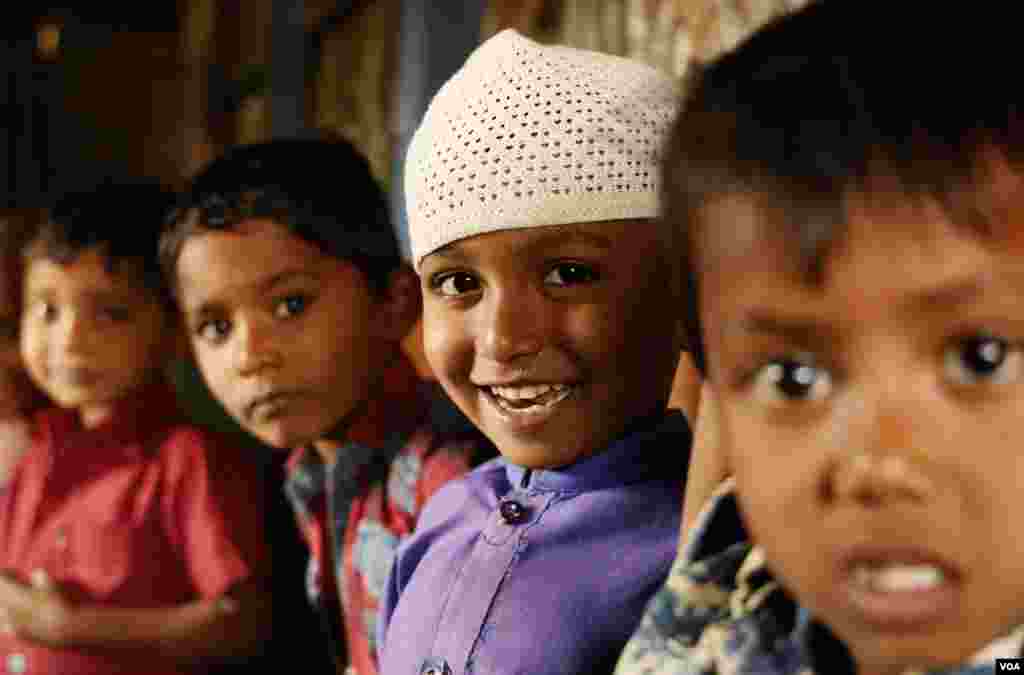 Five-year-old Mohammed Hasan practices saying “good morning” during class 1 English at the Seagull Primary School in Kutupalong refugee camp Feb. 15, 2020. (Hai Do/VOA)