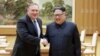 FILE - North Korean leader Kim Jong Un shakes hands with U.S. Secretary of State Mike Pompeo, May 9, 2018, released by North Korea's Korean Central News Agency in Pyongyang.