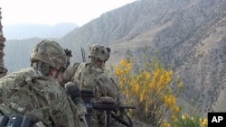 Paratroopers in Bermel spend hours tracking suspected Taliban and mapping their fighting positions, May 2011