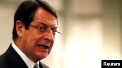 Cyprus' President Nicos Anastasiades addresses a conference of civil servants in Nicosia, March 29, 2013.