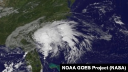 NOAA's GOES-East satellite captured this visible image of Tropical Storm Julia on Sept. 14 at 8:37 a.m. EDT (1237 UTC), centered just 10 miles west of Brunswick, Georgia.