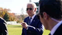 President Joe Biden speaks to reporters as he returns to the White House on Nov. 19, 2021, in Washington, from Walter Reed National Military Medical Center.